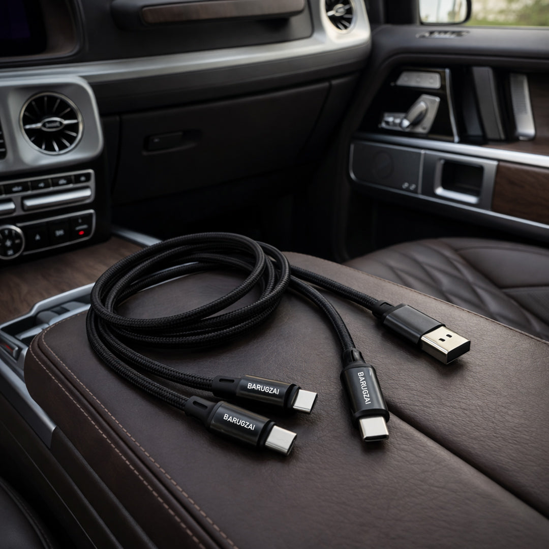 Black 3-in-1 Charging cable USB cable with multiple connectors on a car interior.