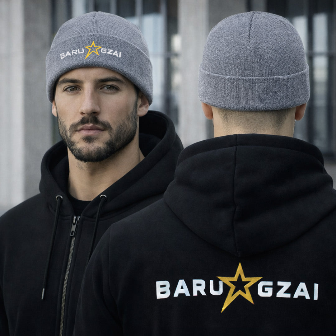 Grey Beanie on a man with barugzai star logo branding.