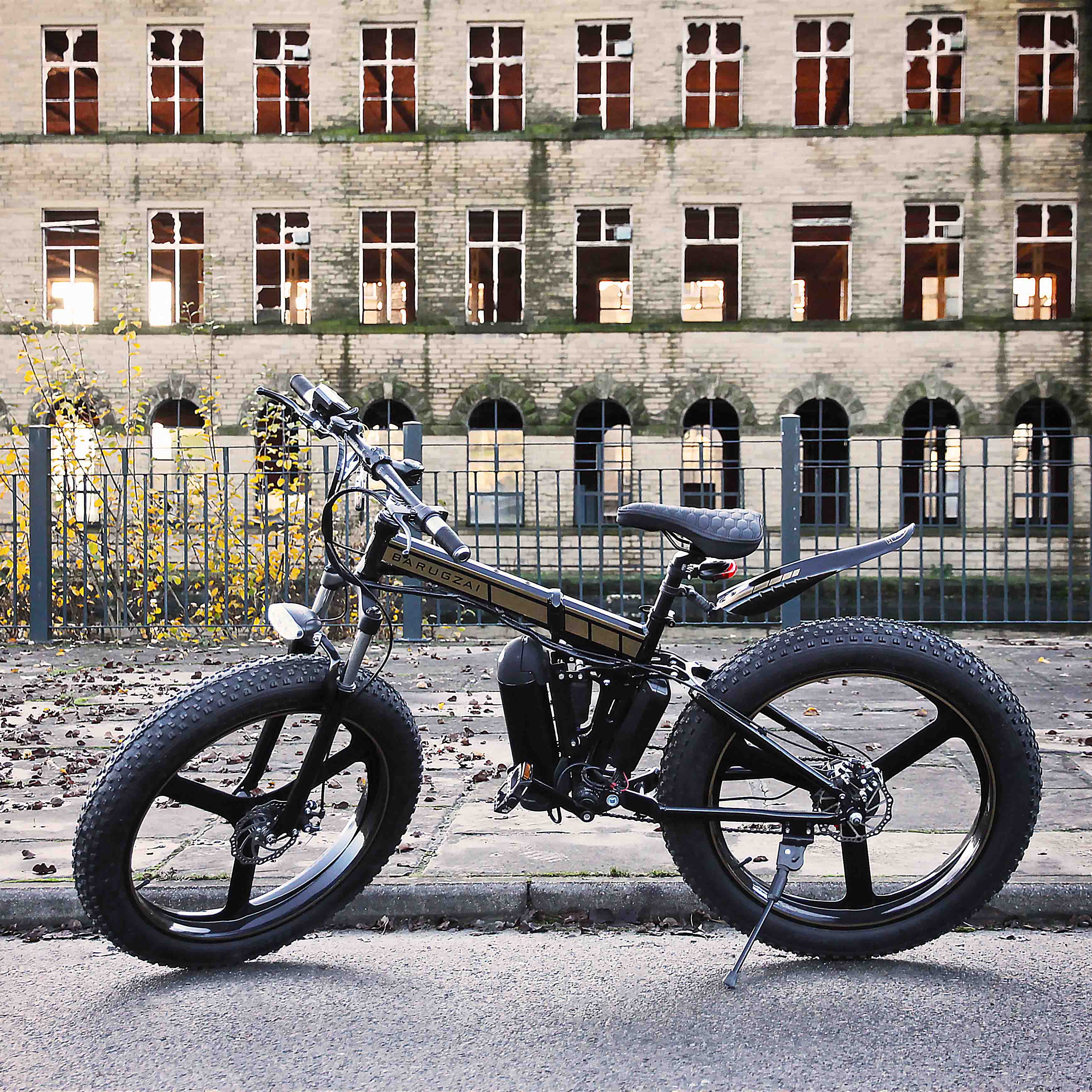 Electric bike parked on a street with a building in the background