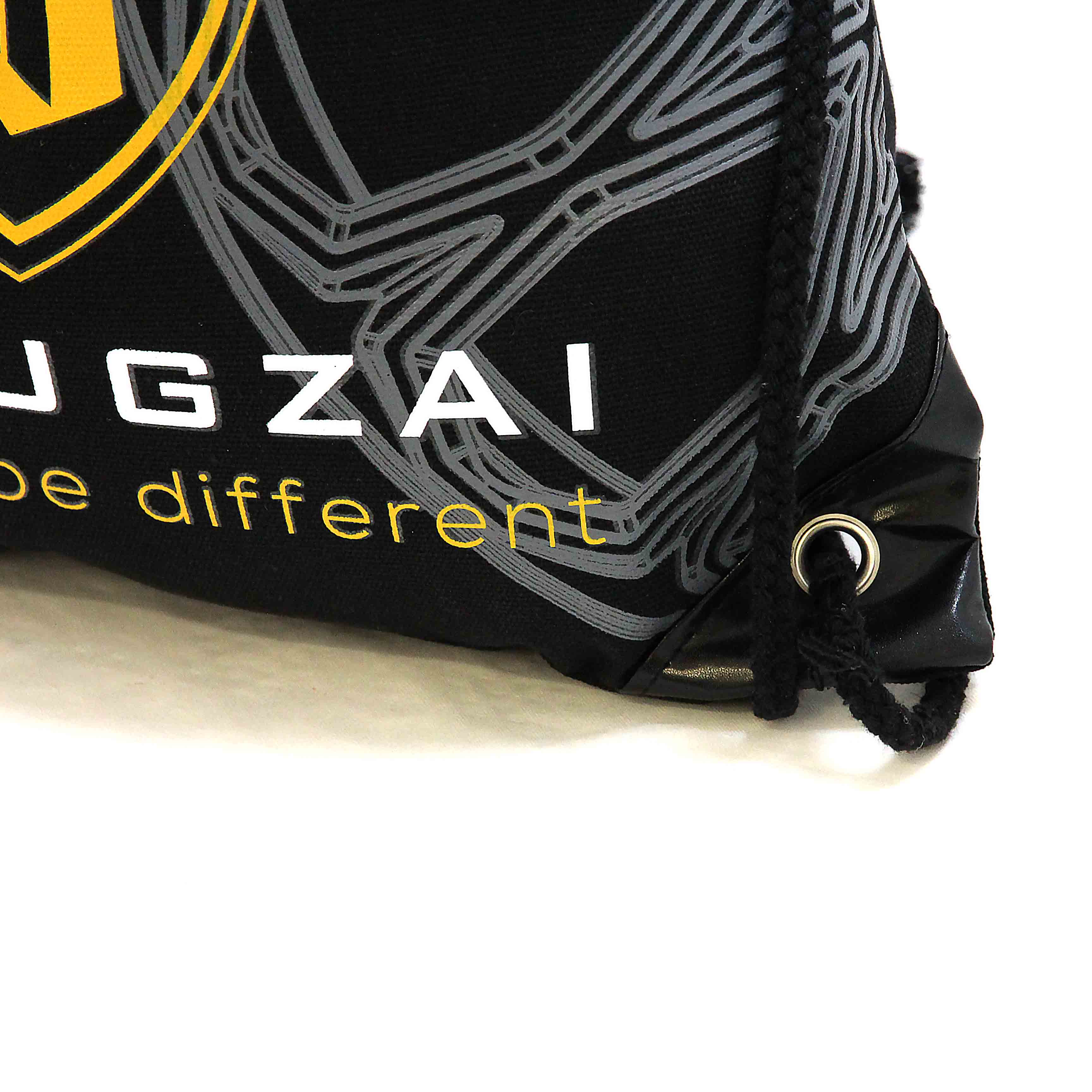 Black drawstring bag with 'UGZAI' branding and text on a white background