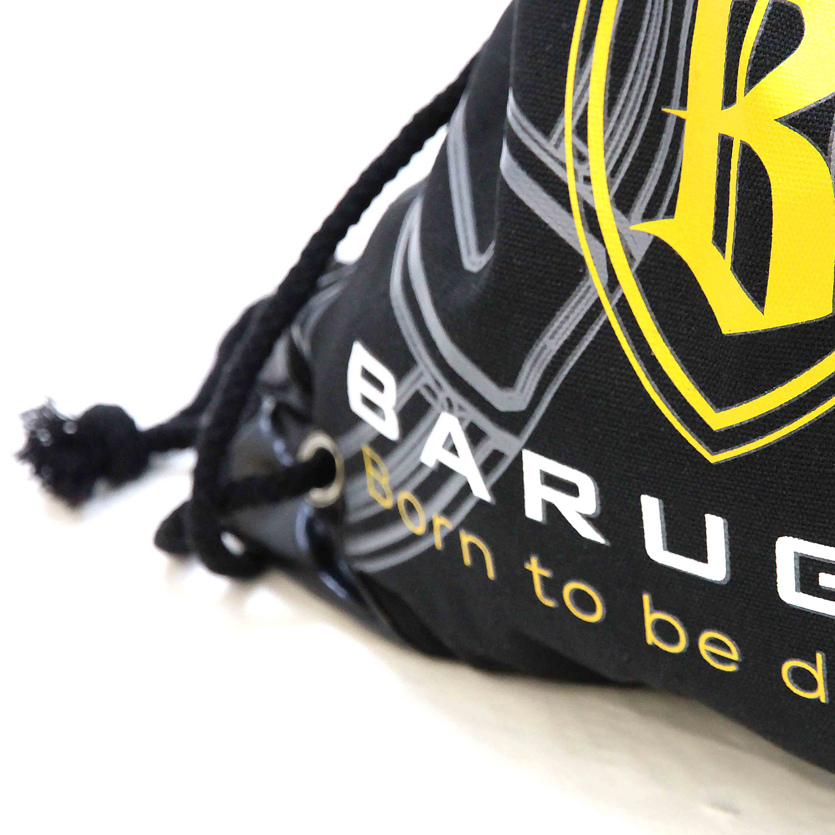 Black drawstring bag with yellow and white branding on a white background