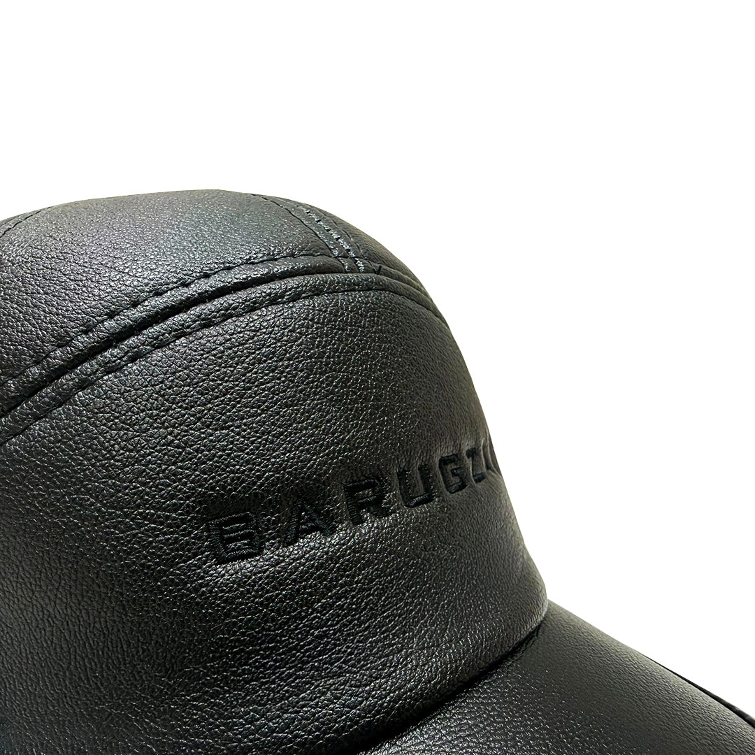 Close-up of a black leather product with "Barugzai" branding on a white background.