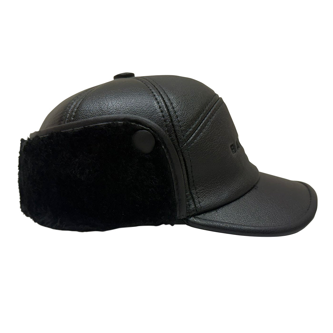 Black leather cap with fur trim on a white background