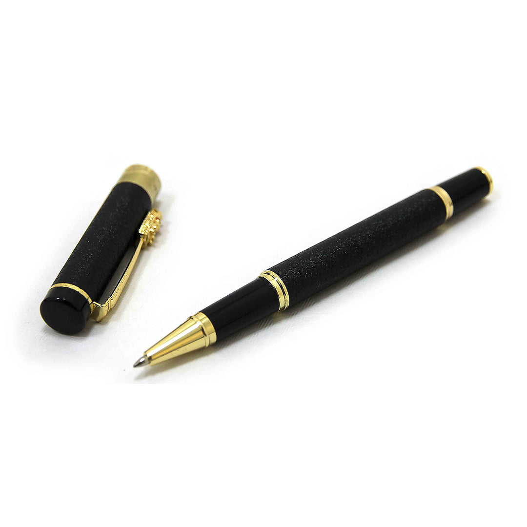 Black Executive Pen with gold accents on a white background