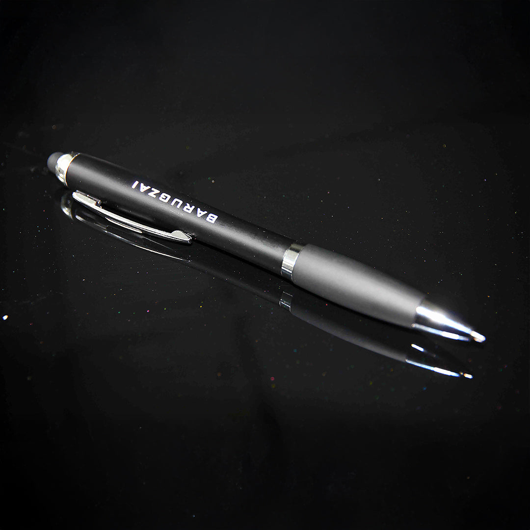 Black Barugzai 3-in-1 pen with silver accents on a black background.