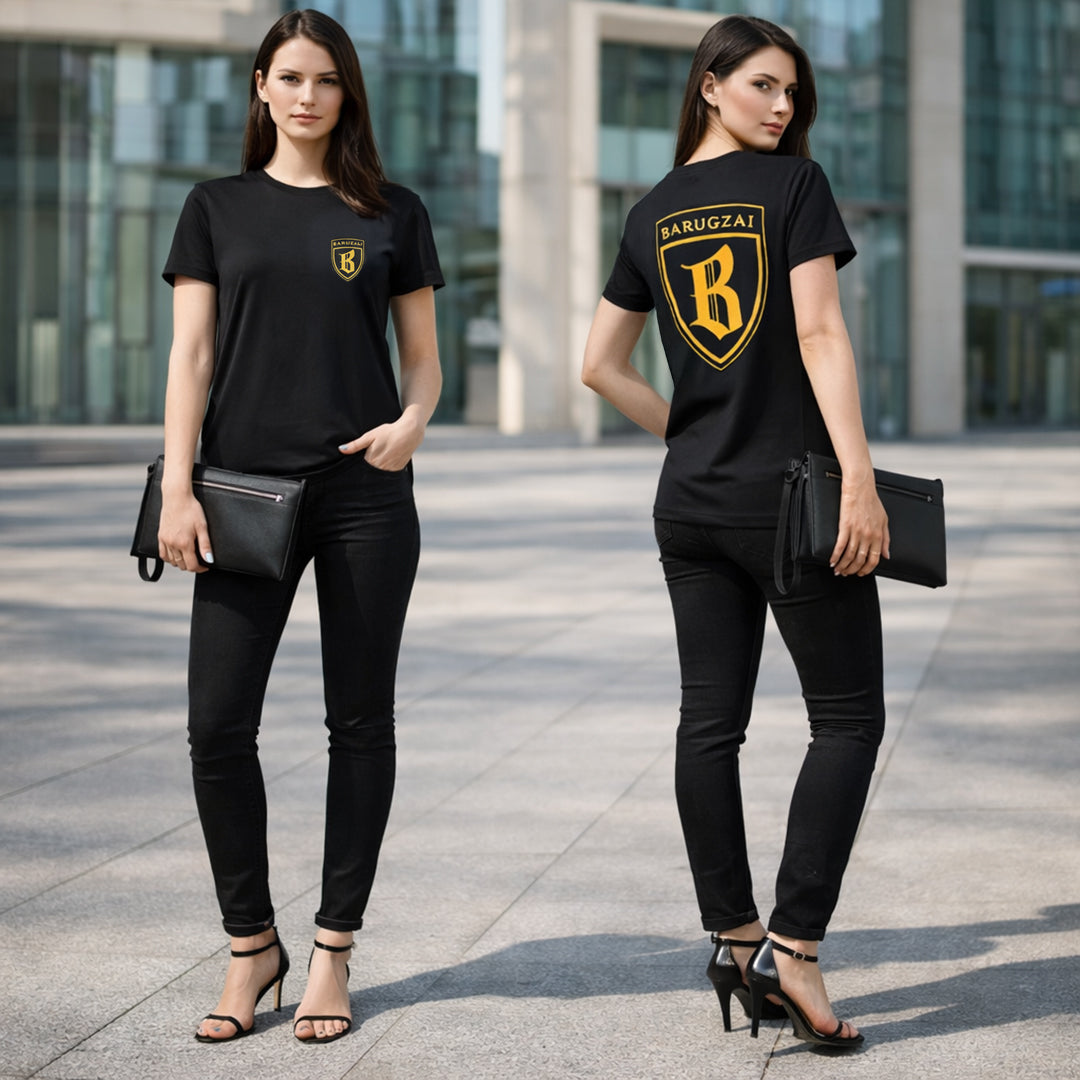 Two women wearing black barugzai shield t-shirts with a yellow logo in an urban setting, holding a leather barugzai clutch bag.