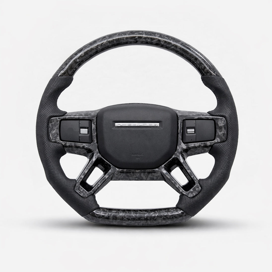 Carbon fiber steering wheel on a white background