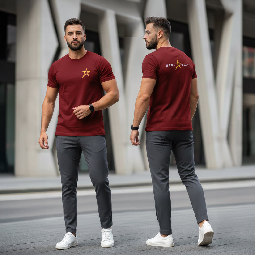 Barugzai Essentials B-Star burgundy t shirt rear Barugzai wordmark with the male wearing it in a urban setting.