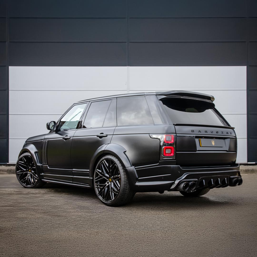 Rear quarter hero shot of Satin Grey Range Rover Bison II Wide Bodykit highlighting diffuser, spoilers, and Barugzai branding.