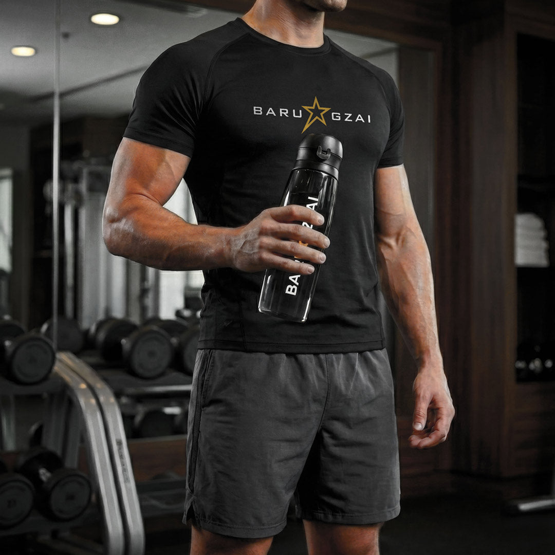 Barugzai B-Fit gym bottle in gym lifestyle setting held by athlete
