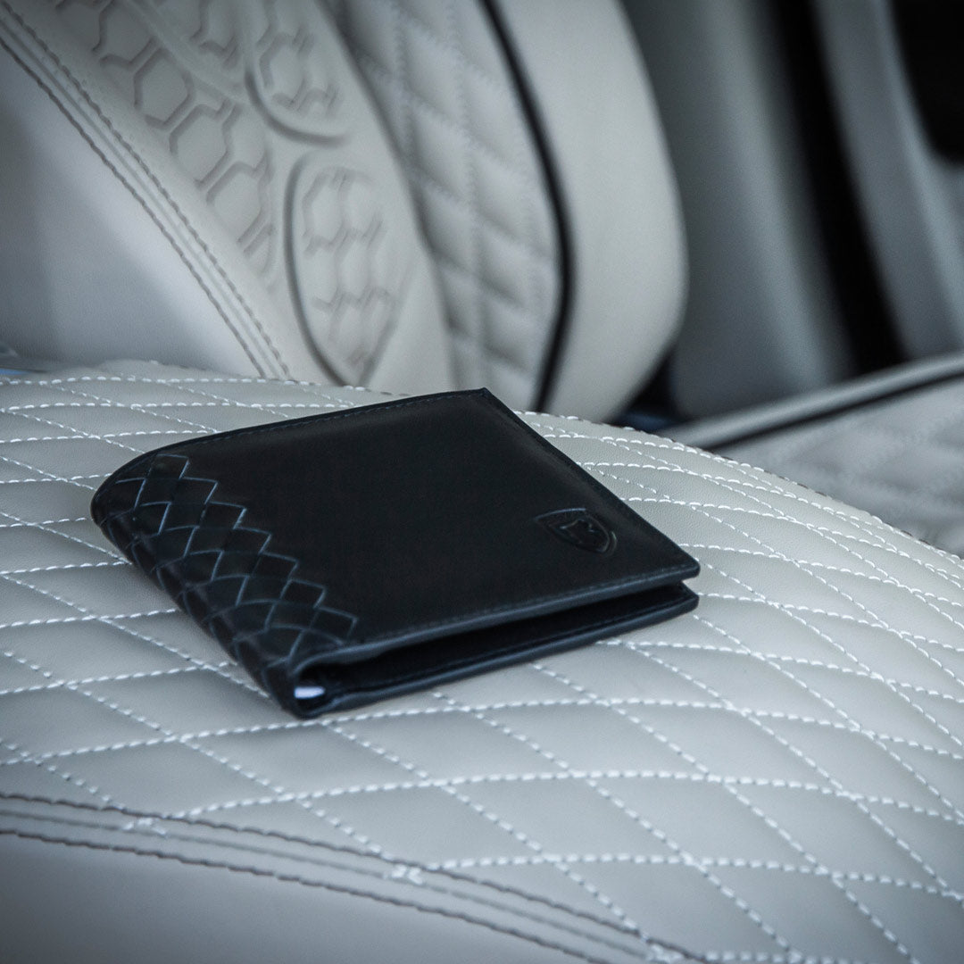 Barugzai leather wallet lifestyle shot inside luxury vehicle interior