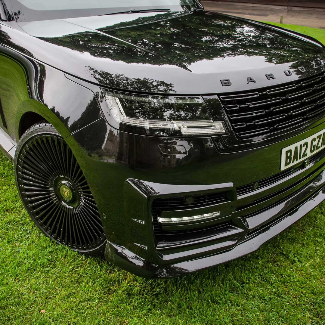 Black Close-up of Barugzai Nebula Body Kit front bumper apron on Range Rover L460