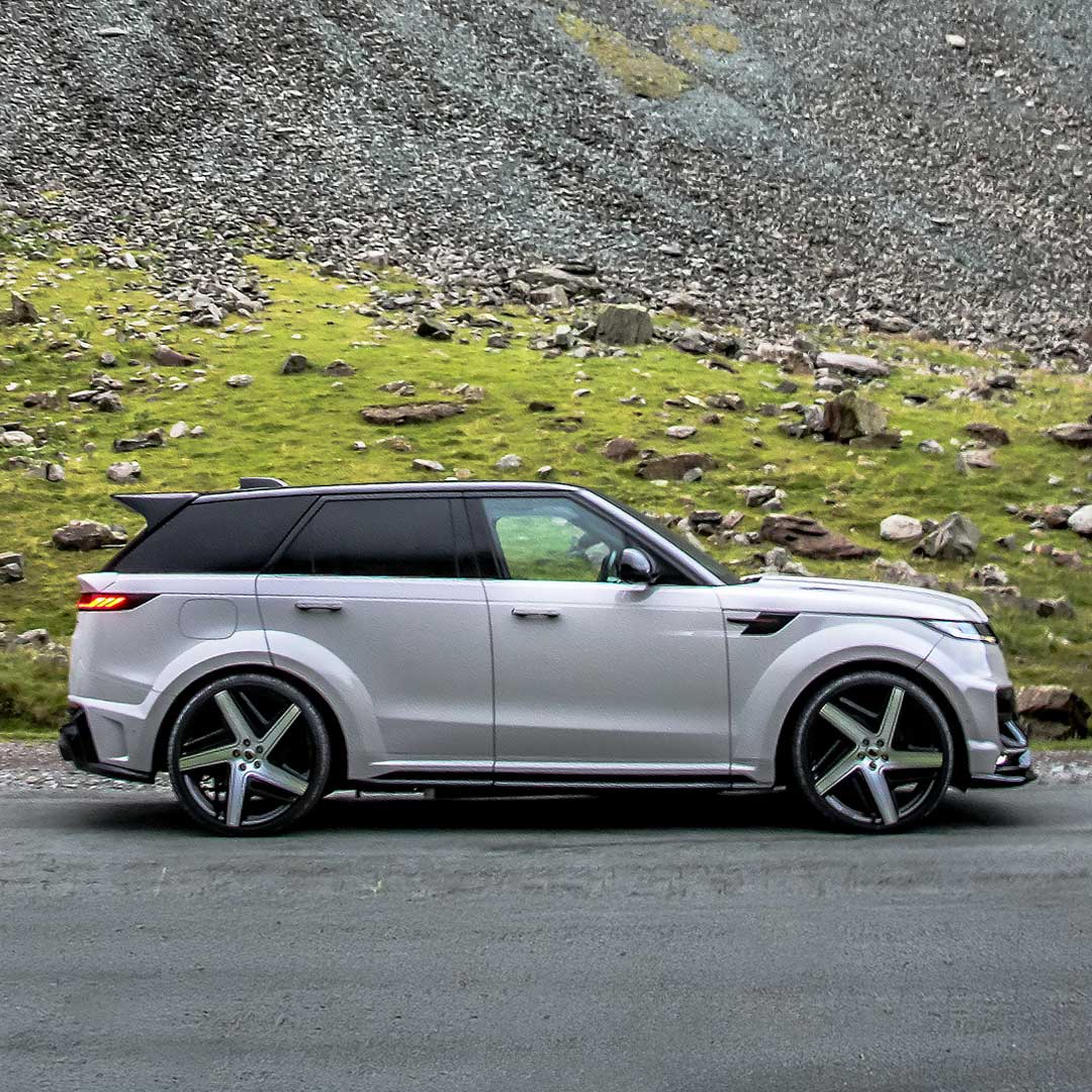 Nardo Grey Range Rover Sport L461 side profile showcasing Barugzai Raptor wide arches and sculpted side skirts