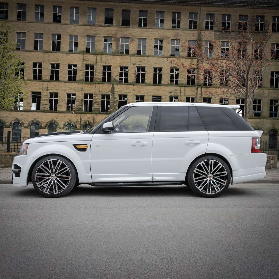 Side hero shot of white Range Rover Sport L320 with Classic Sport 320 side skirts and Barugzai styling