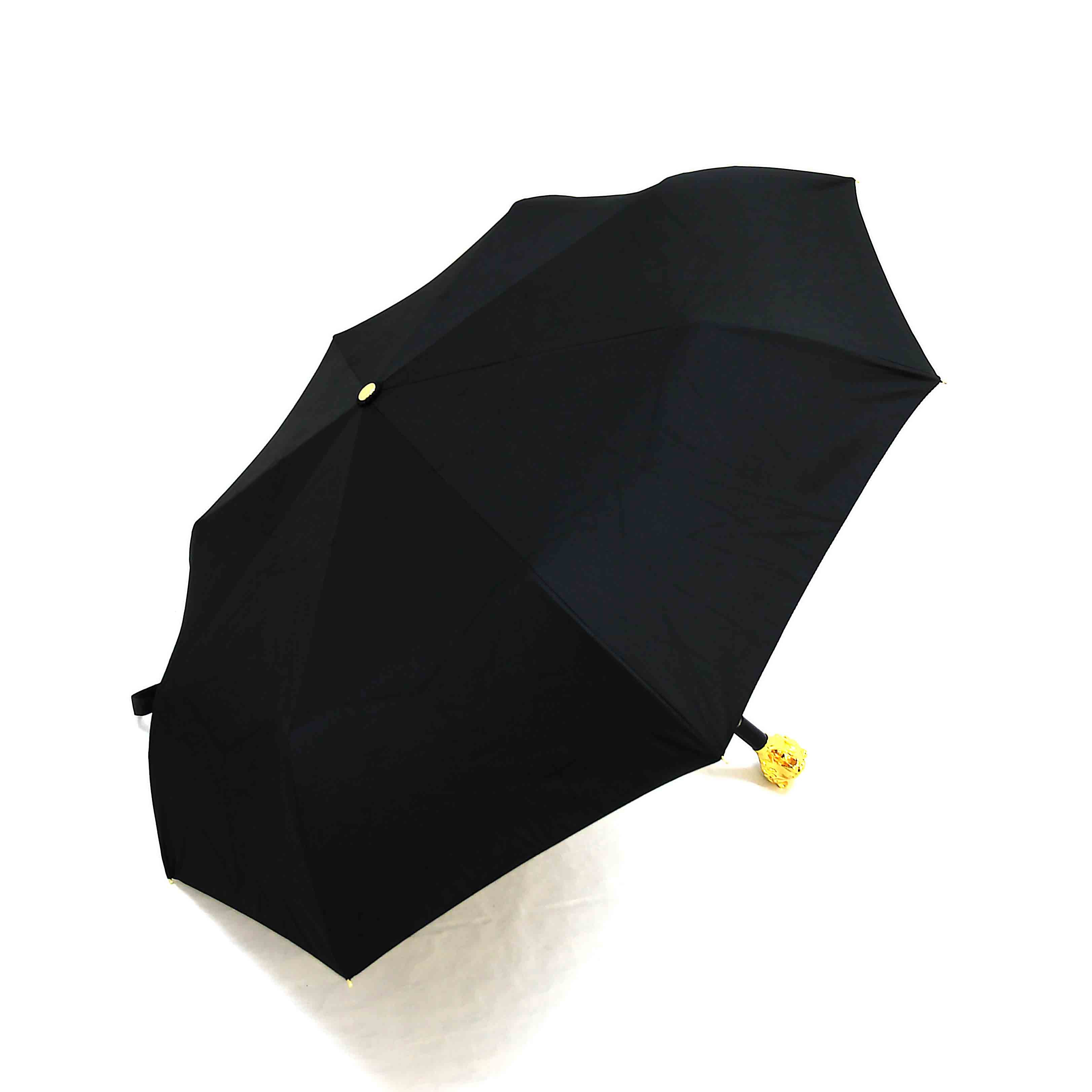 Black umbrella with yellow accents on a white background.