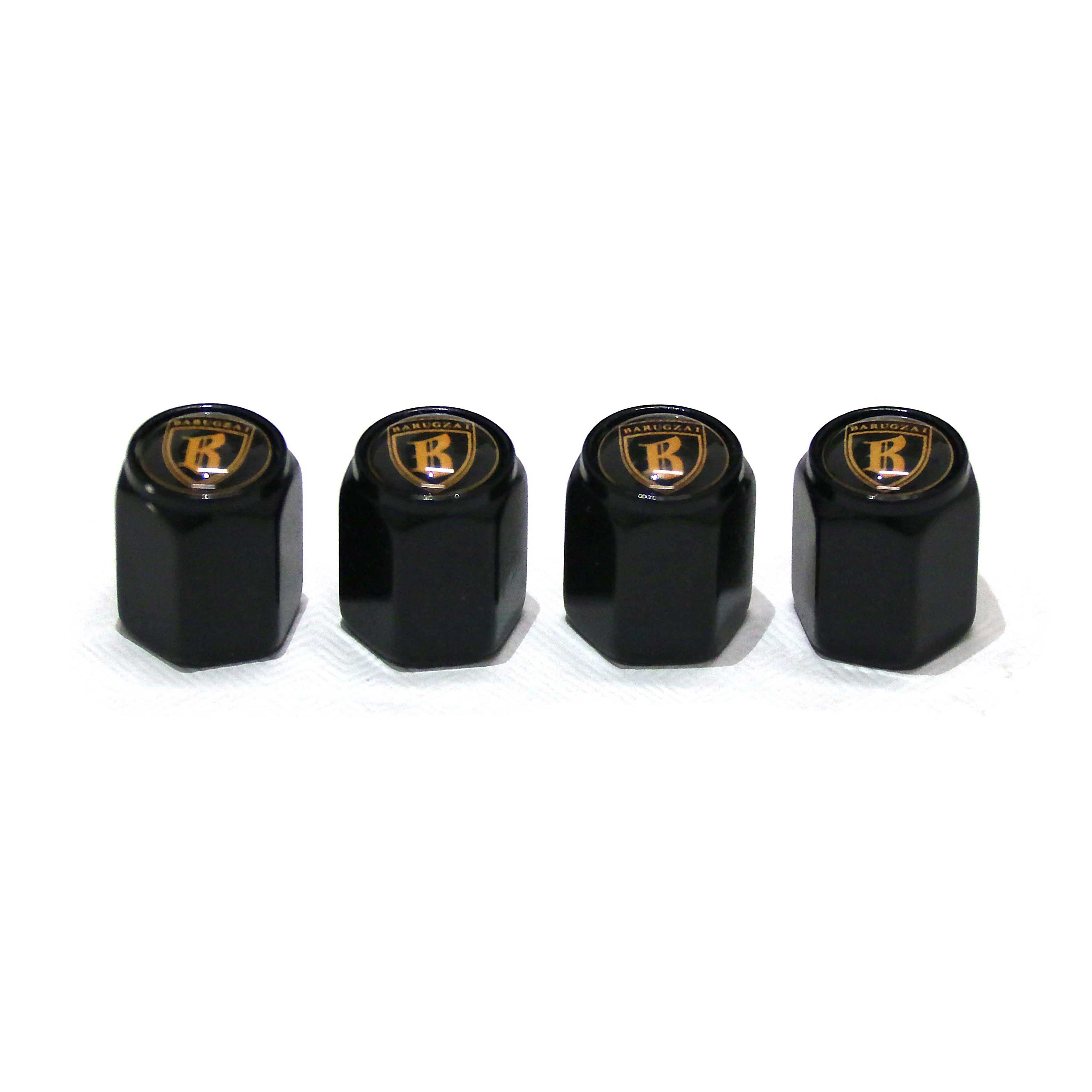 Four black valve stem caps with a black logo on a white background