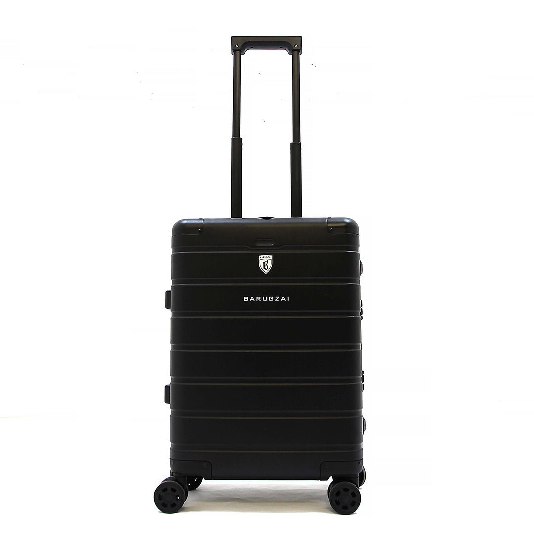 Black suitcase with wheels and handle on a white background.