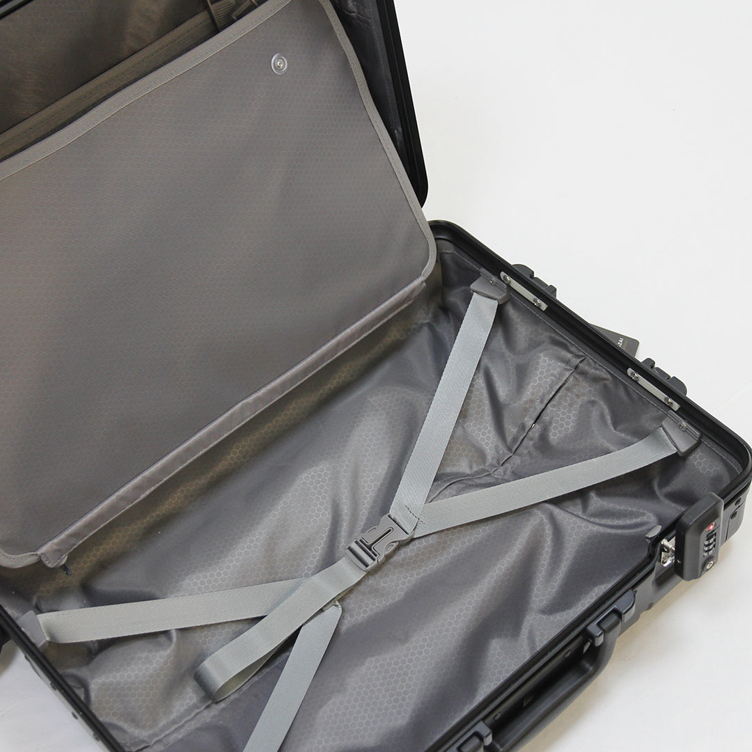 Open black suitcase with interior compartments and straps on a white background.