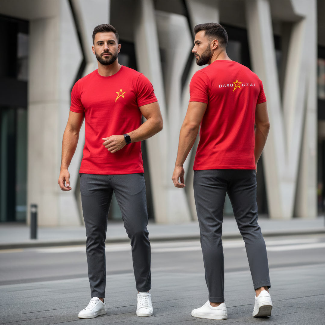 Male model wearing Barugzai Essentials B-Star lightweight t shirt urban setting. Male wearing the RED T-Shirt. 