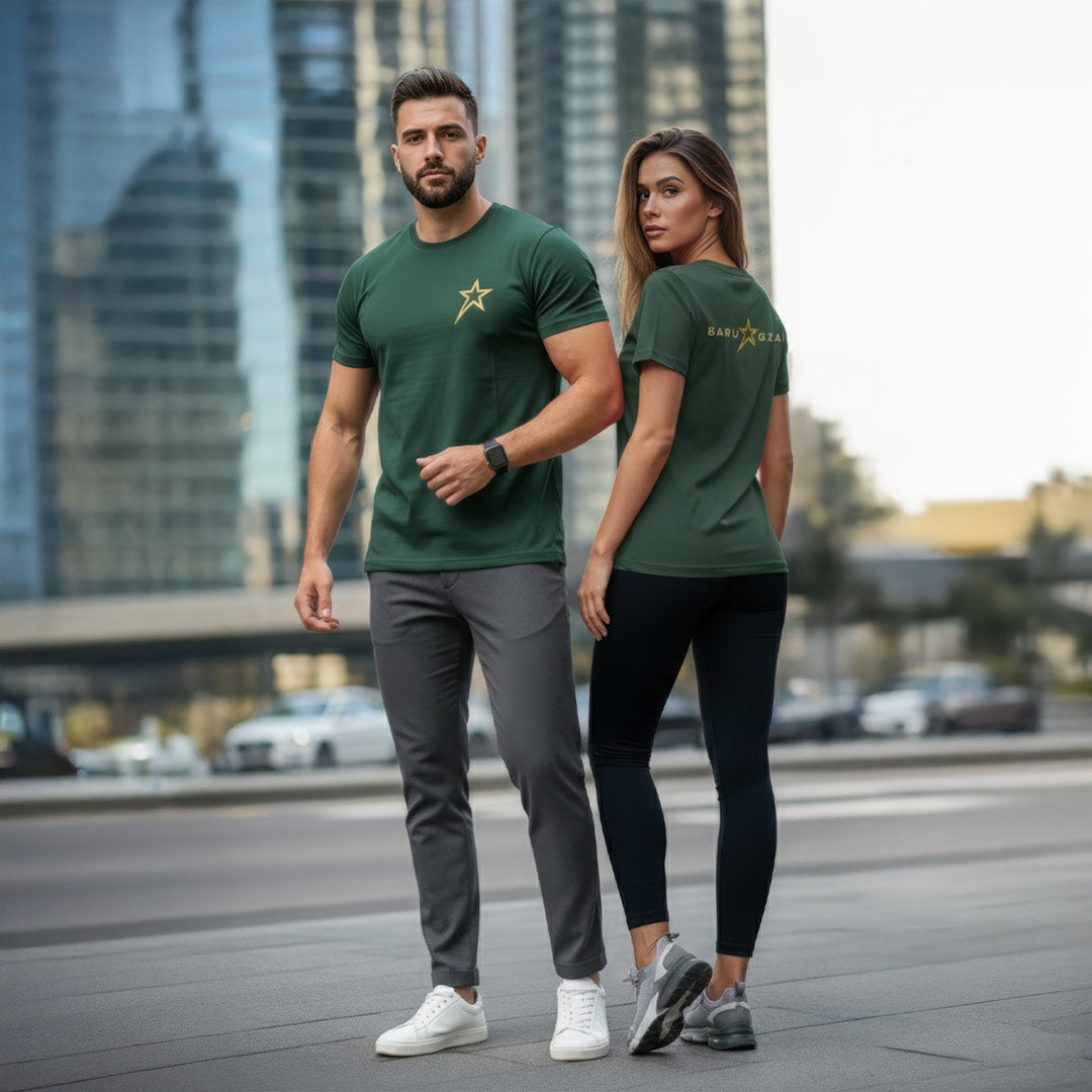 Male and female wearing green Barugzai Essentials B-Star lightweight t shirts in an urban setting.