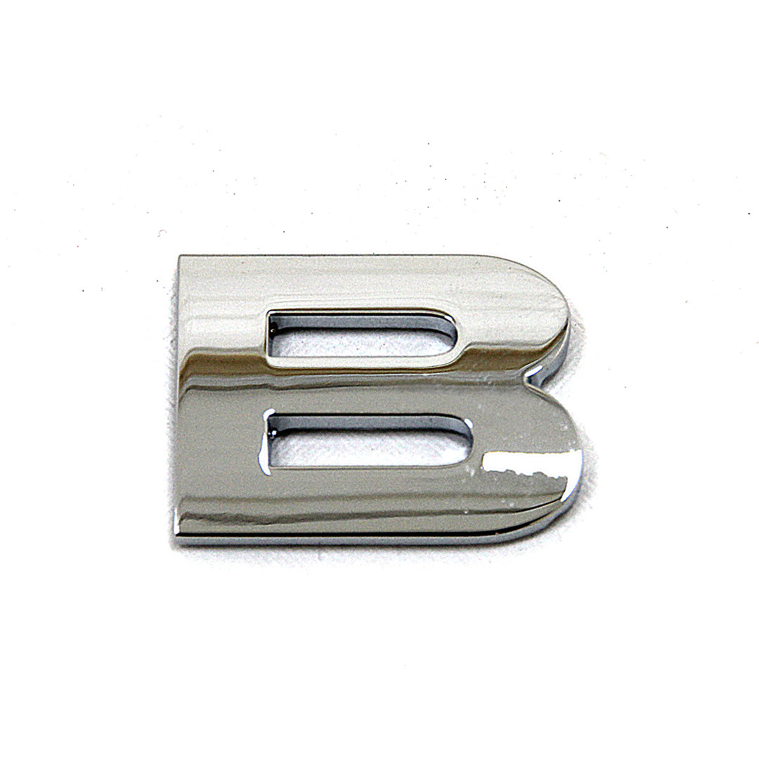 Chrome letter 'B' lettering on a white background