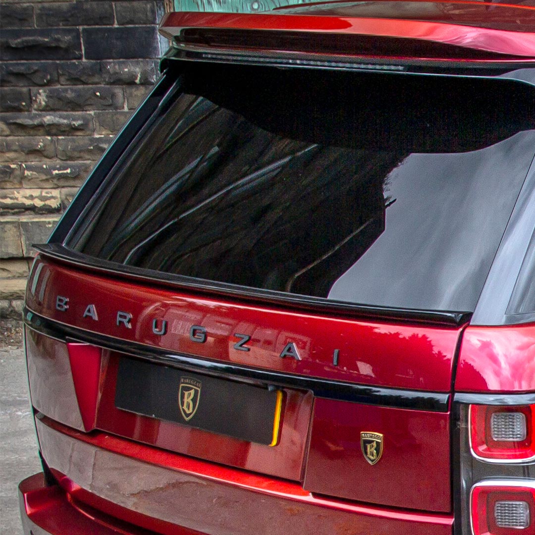 Close-up of the Red Bison rear spoilers with Barugzai branding elements.