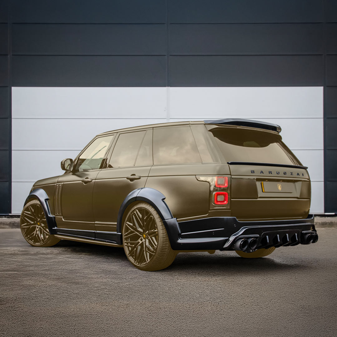 Rear quarter hero shot of Satin Grey Range Rover Bison II Wide Bodykit highlighting diffuser, spoilers, and Barugzai branding, components revealed