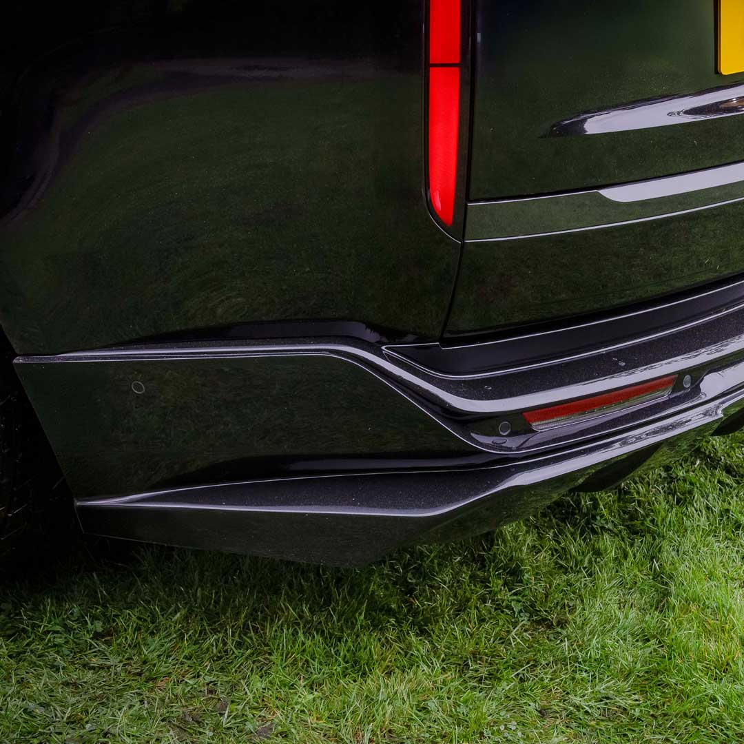 Black Detail view of Barugzai Nebula Body Kit rear apron diffuser on Range Rover L460